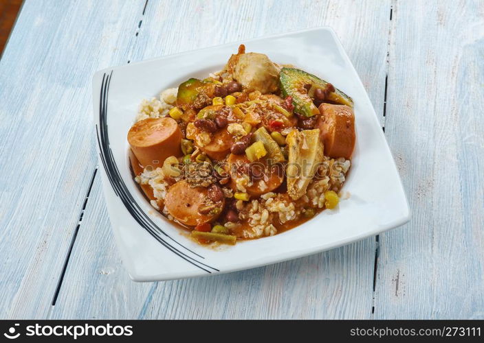 Slow Cooker Creole Chicken and Sausage, large slow cooker, combine the chicken, sausage, creole seasoning,