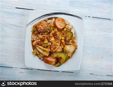 Slow Cooker Creole Chicken and Sausage, large slow cooker, combine the chicken, sausage, creole seasoning,