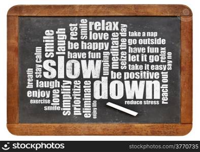 slow down and relax - reducing stress tips in a form of a word cloud on a vintage blackboard