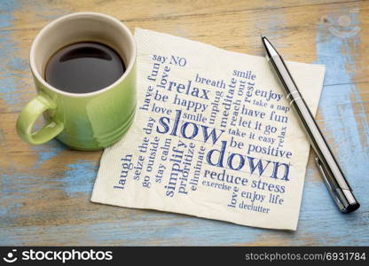 slow down and relax - reducing stress tips in a form of a word cloud on a napkin with a cup of coffee