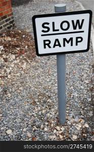 slow ramp sign to alert drivers to be careful and speed/slow down