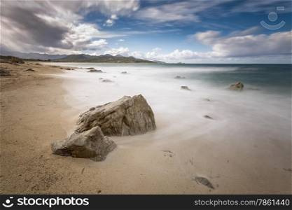 Slow shutter speed shot of Lozari beach in the Balagne region of northern Corsica with Ile Rousse in the background