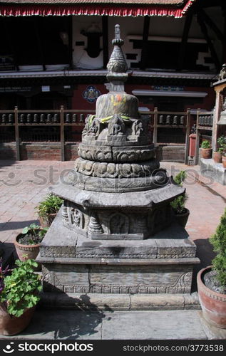 Smal stone stupa in Rudvarna Mahavihar in Patan, Nepal