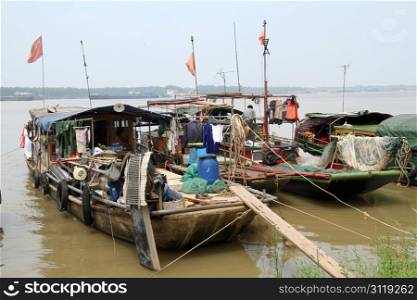 Smal wooden boats on the Yangtze river, China