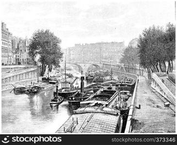 Small arm of the Seine between the City and the Quai des Augustins, vintage engraved illustration. Paris - Auguste VITU ? 1890.