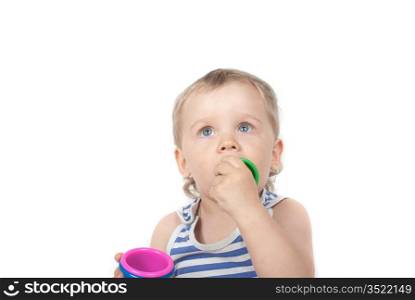 Small baby boy with a toy pyramid isolated on white