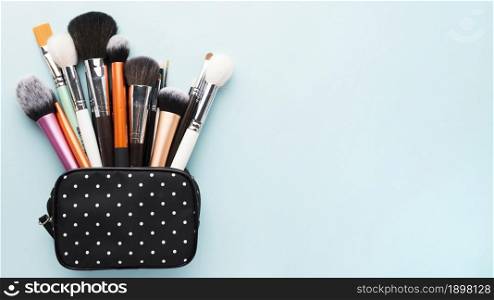 small bag with makeup brushes. Resolution and high quality beautiful photo. small bag with makeup brushes. High quality beautiful photo concept