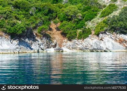 Small beach and summer coast view from motorboat (Kefalonia, not far from Agia Effimia, Greece)
