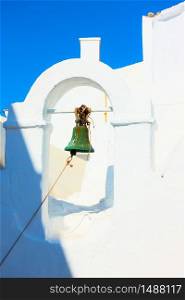 Small bell tower of ancient greek church in Mykonos town (Chora), Greece - architectural detail