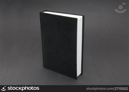 Small black notebook with blank cover