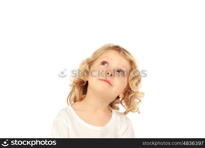 Small blond child imagining something isolated on a white background
