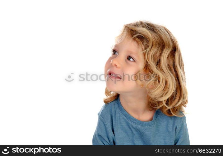 Small blond child imagining something isolated on a white background