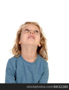 Small blond child imagining something isolated on a white background