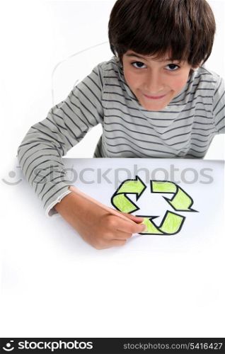 Small boy drawing recycle logo