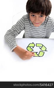 Small boy drawing recycle logo
