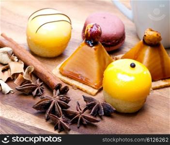 Small cakes on a wooden tray