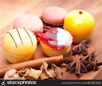 Small cakes on a wooden tray