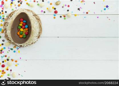 small candies open easter chocolate egg table