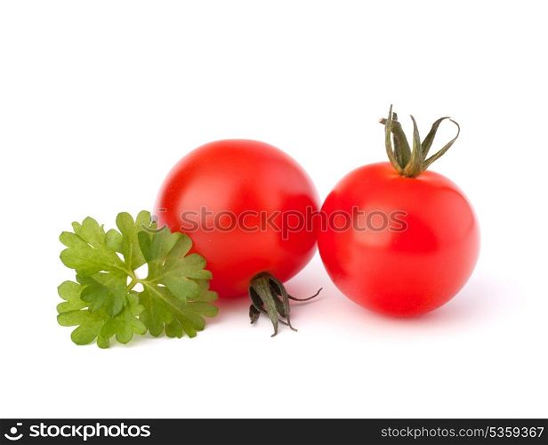 Small cherry tomato and parsley spice on white background close up
