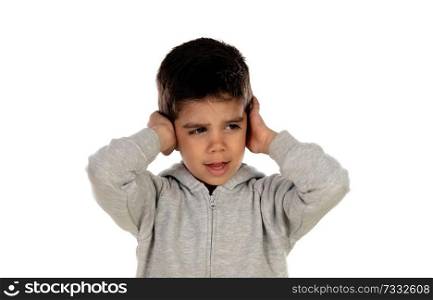 Small child covering his ears isoalted on a white background