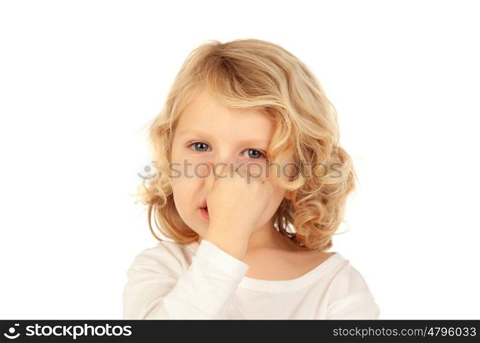 Small child covering his nose isolated on a white background