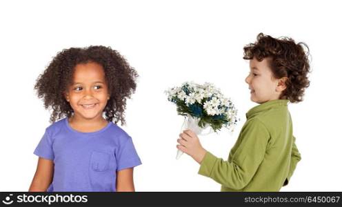 Small child giving a bouquet to his girl isolated on a white background