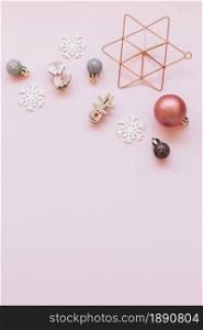 small christmas toys pink table. Resolution and high quality beautiful photo. small christmas toys pink table. High quality and resolution beautiful photo concept