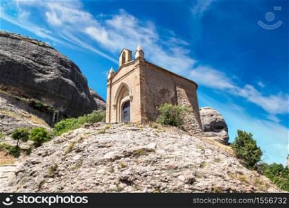 Small church in Santa Maria de Montserrat abbey in Monistrol, in a beautiful summer day, Catalonia, Spain