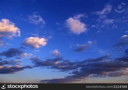 Small Clouds In A Blue Sky At Dawn