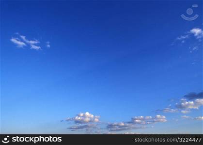 Small Clouds In A Clear Blue Sky