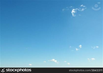 small clouds on blue sky