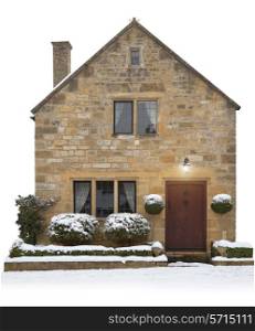 Small Cotswold cottage cut-out on white background, Broadway, Worcestershire, England.