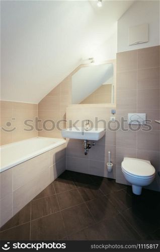 Small cute bathroom in an apartment, modern design