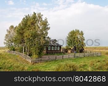 Small farmstead in North of Russia, sunny autumn day