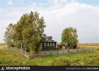 Small farmstead in North of Russia, sunny autumn day