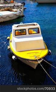 Small fishing boat in Old port of Dubrovnik, Croatia