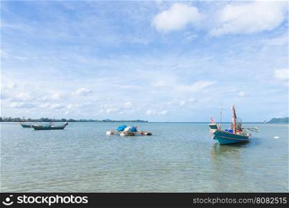 Small fishing boats. Parking on the sea beach. In the daytime sky