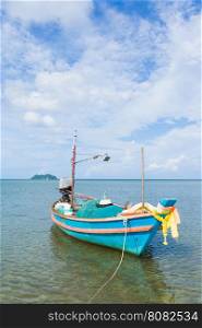 Small fishing boats. Parking on the sea beach. In the daytime sky