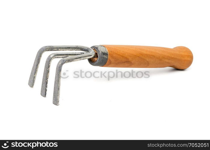 Small gardening fork isolated on white. Studio shot.