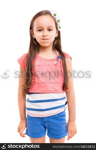 Small girl playing and making a silly expression - isolated over white