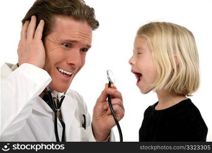 Small girl screaming into doctor&acute;s stethoscope