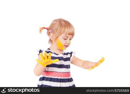 Small girl with yellow paint on her palms isolated on white&#xA;