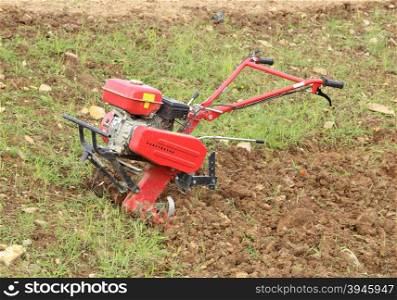 small hand tractor in the garden