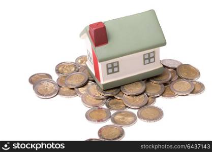 small house and coins, concept, isolated on white background