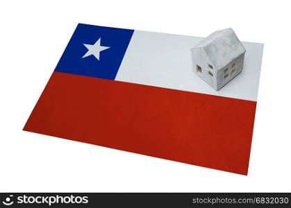 Small house on a flag - Living or migrating to Chile