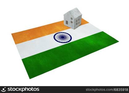 Small house on a flag - Living or migrating to India