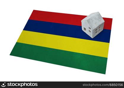 Small house on a flag - Living or migrating to Mauritius