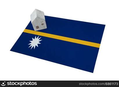 Small house on a flag - Living or migrating to Nauru