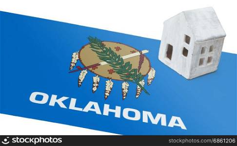 Small house on a flag - Living or migrating to Oklahoma