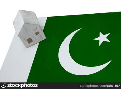 Small house on a flag - Living or migrating to Pakistan